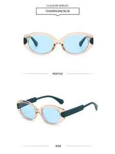 Front and side views of vintage oval champagne sunglasses with light blue lenses