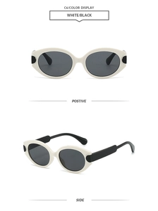 Detail view of retro oval cat-eye sunglasses in cream white and black frame