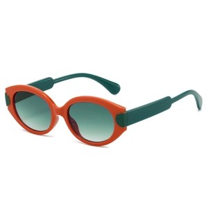 Retro oval sunglasses with orange frame and green temples in a 45-degree angle shot