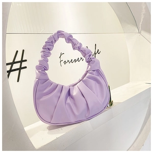 Macro shot of the lavender pleated hobo bag showing the high-quality leather texture
