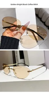 Détail de lunettes de soleil sans monture avec branches dorées et verres marron clair