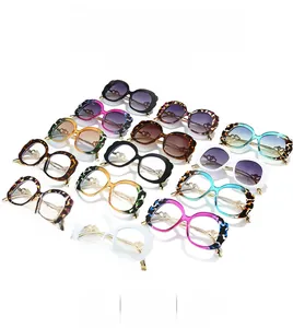 Collection of oversized oval sunglasses featuring metallic gold hollow heart temples