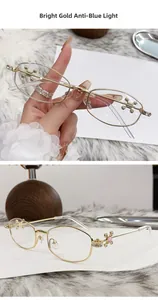 Detail view of gold polygon metal frame glasses with rhinestone butterfly accents