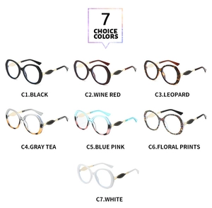 Présentation à plat de lunettes ovales surdimensionnées en sept tons avec détail feuille