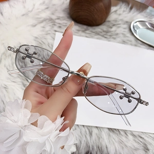 Fashion polygon metal sunglasses with sparkling rhinestone accents and light gray lenses