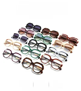 Detailed grid view of diverse large polygon frame sunglasses in multiple trendy colors