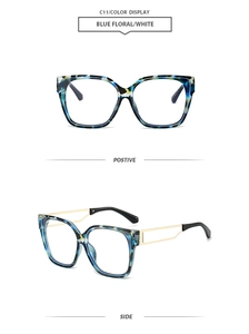 Detail of square oversized blue floral sunglasses with gold metal temples and tortoise texture