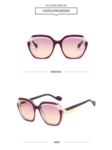 Front and side views of purple gradient oversized polygon sunglasses with gold details