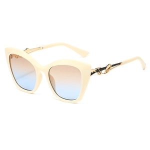 Lunettes de soleil œil de chat oversize tendance avec monture crème et verres dégradés