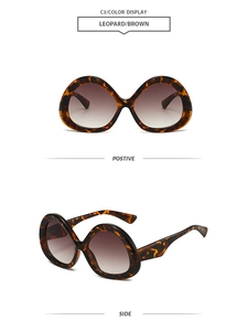 Front and side views of leopard print oversized butterfly sunglasses with brown lenses