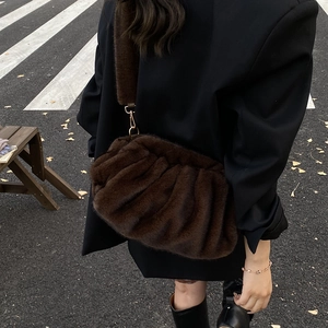 Retro brown fuzzy square bag with soft fur texture and cloud shape shoulder strap