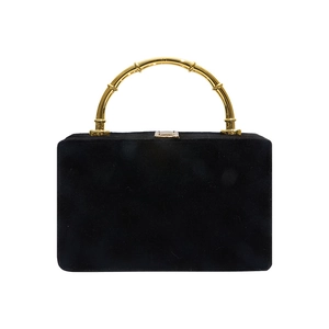 Sac carré minimaliste en daim noir avec poignée en bambou doré et fermoir chic