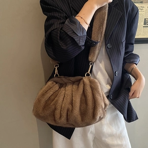 Retro brown plush crossbody bag with gold hardware and stylish pleated cloud design