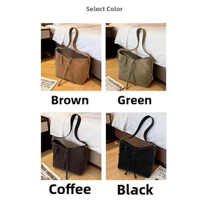 Detailed view of large matte suede tote bags in brown, green, coffee, and black tones