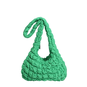 Emerald green quilted puff tote bag with soft pleated texture and large capacity for winter