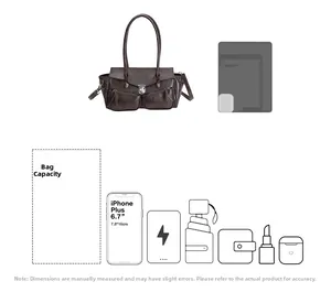 Brown vintage leather tote bag showing capacity for phone, umbrella and wallet