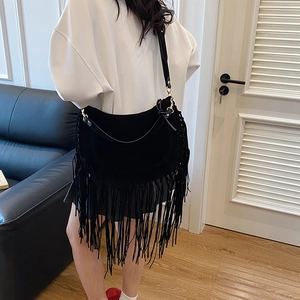 Retro black suede hobo bag with long fringe and adjustable strap for women