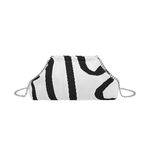 Minimalist knit shell bag with black number 21 design and silver chain strap