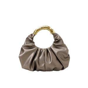 Elegant bronze pleated cloud handbag with unique bamboo-textured metal curved handle