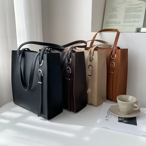 Minimalist large-capacity leather tote bags in four colors with silver metal buckle details