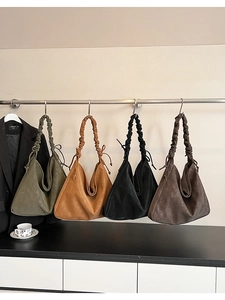 Detailed set of four large leather tote bags in olive, caramel, black, and coffee brown
