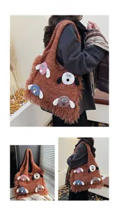 Detail of knit tote bag featuring cartoon animal patches and stylish fringe tassels
