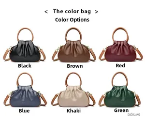 Cloud dumpling bags in black, brown, red, blue, khaki, and green colors with wooden handles