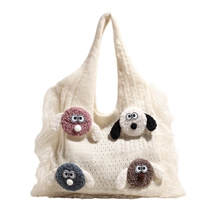 Cute white knit tote bag with colorful plush cartoon charms and long side tassels