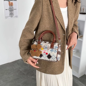 Vintage fuzzy plush boston bag with blue and brown contrast pattern and bear charm