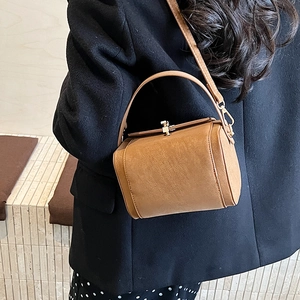 Brown vintage minimalist crossbody handbag with gold clasp and top handle for women