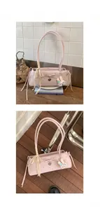 Détail du sac floral rose avec nœud ruban et joli pendentif en peluche lapin