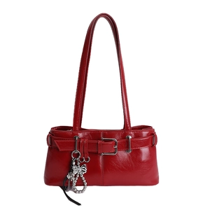 Deep red Y2K shoulder bag with silver buckle and metallic butterfly charm detail