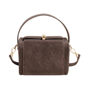 Vintage dark brown box-shaped handbag with gold metal clasp and top handle for women