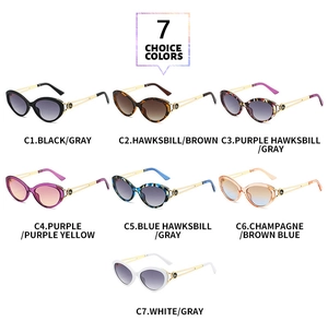 Matrix display of vintage cat-eye sunglasses with gold metal temples in seven colors