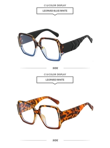 Detail of leopard print wide-temple square sunglasses showing blue and brown patterns