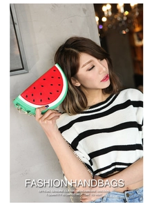 Detailed view of the watermelon slice handbag with artificial leather and gold chain