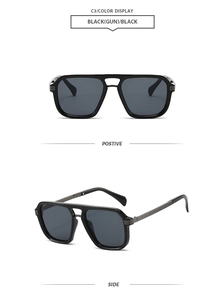 Detail view of black square pilot sunglasses with gunmetal double-bridge frames and dark lenses