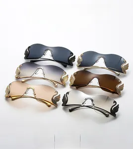 Detail of rimless sunglasses with swan-shaped rhinestone temples in various gradient lens colors