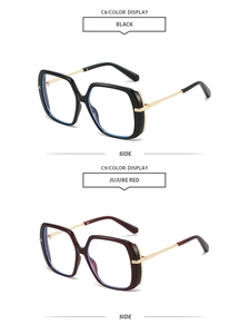 Detail view of square oversized sunglasses in black and jujube red with metal temples