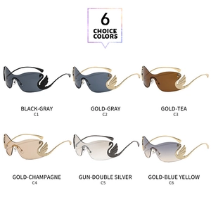 Detailed view of swan-shaped metal decoration on rimless oversized sunglasses