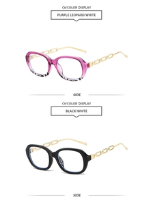 Detail of small frame sunglasses with gold chain temples in black and purple leopard