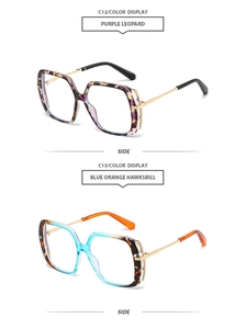 Detail of square glasses with purple leopard and blue orange hawksbill patterns and metal temples