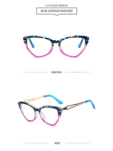 Detail view of cat-eye sunglasses with blue leopard and rose red frames and gold metal temples