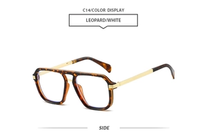 Detail of leopard print square frames with gold metal temples and double bridge design
