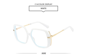 Side view of white oversized square sunglasses with gold metal temples and blue light coating