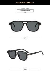 Detail view of square double bridge sunglasses with black frames and gold metal accents