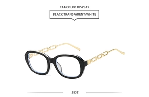 Detail of black eyewear frame featuring unique gold metal chain temple design