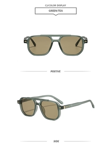 Macro view of retro square sunglasses with double bridge and green translucent frames