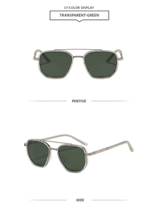 Detail of silver metal double bridge aviator sunglasses with transparent green lenses