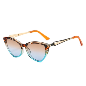 Modern cat-eye sunglasses featuring tortoiseshell and gradient blue frames with metal temples